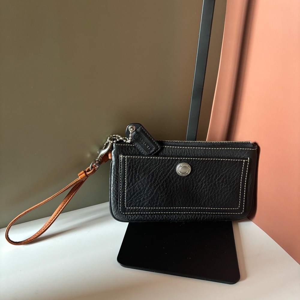 COACH Black Pebbled Leather Wristlet with Tan Strap